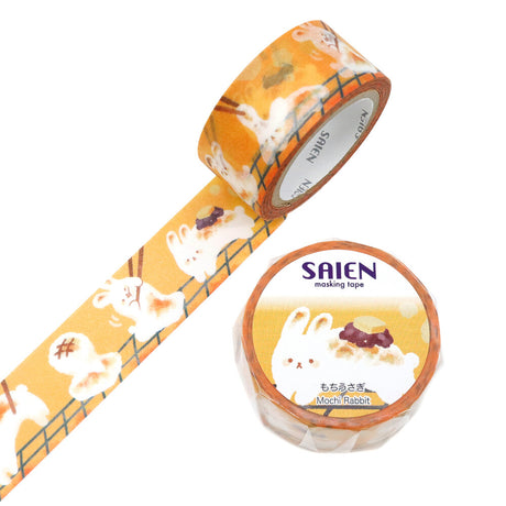 Plump little watercolor rabbits hop across this tape like tiny mochi treats, round, gentle, and irresistibly cute. Their soft orange hues pair beautifully with the translucent texture of Japanese paper, giving each bunny a warm, glowing sweetness. Part of SAIEN’s Time of Fruits series, this design blends delicate color with a cozy, hand‑painted charm.