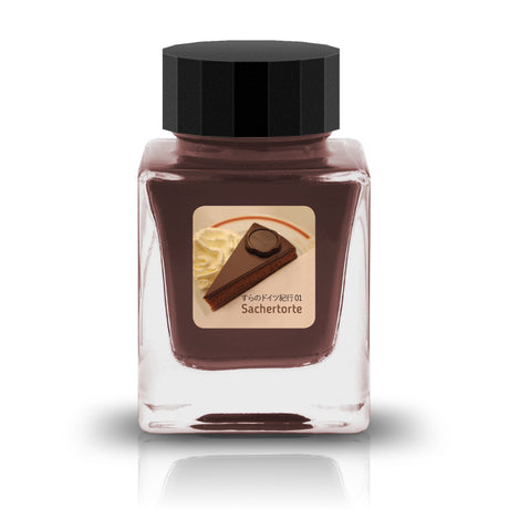 すらのドイツ紀行 01 Sachertorte&nbsp;Ink

The Sura &amp; Gucchi Collection is a collaboration with 2 ink masters who developed the color palette and are known for unique and vibrant colors. These inks are a tribute to the unique ink making styles within their community.&nbsp;

RGB: 91, 56, 51
Brown with gold sheen

30ml