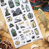 🦴 Step into a shadowy collector’s study with @whiteriverartstudio’s beautifully eerie sheet, filled with preserved specimens, glass jars, bones, skulls, sea creatures, botanicals, and curious little relics. With its antique museum feel and moody natural history details, this sheet is perfect for anyone drawn to the strange, the beautiful, and the wonderfully mysterious.