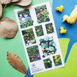 🪷🐟 Pond day? Pond day. @zoe.art.garden brings us the most peaceful little pond. Koi are swimming, ducks are floating, lotus blooms are showing off, and the lily pads are basically VIP lounges for every tiny pondside creature. This sheet is lush, splashy, and wildly dreamy, like you accidentally wandered into this jaw dropping scene and decided, actually, we live here now.

Art by: @zoe.art.garden

• One sticker sheet is included.
• Top Coating: None
• Adhesive Layer: Paper
• Backing Layer: Clear PET
• 6.6