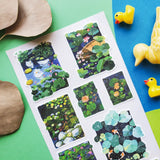 🪷🐟 Pond day? Pond day. @zoe.art.garden brings us the most peaceful little pond. Koi are swimming, ducks are floating, lotus blooms are showing off, and the lily pads are basically VIP lounges for every tiny pondside creature. This sheet is lush, splashy, and wildly dreamy, like you accidentally wandered into this jaw dropping scene and decided, actually, we live here now.

Art by: @zoe.art.garden

• One sticker sheet is included.
• Top Coating: None
• Adhesive Layer: Paper
• Backing Layer: Clear PET
• 6.6