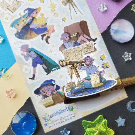 💫🔭 We gotta introduce you to Stella! @jenishiiarts_’s adventurous star-chasing witch with a mission to return fallen stars to the sky! I mean, what’s cooler than that? When she’s not busy studying the celestial lights, face buried in a book or peering through her telescope, you can find her soaring through the cosmos, hopping from star to star. Cheer her on with this amazing sticker sheet and postcard set! Art by: @jenishiiarts_

Top Coating: None
Adhesive Layer: Paper
Backing Layer: Paper
6.69" x 3.54".
