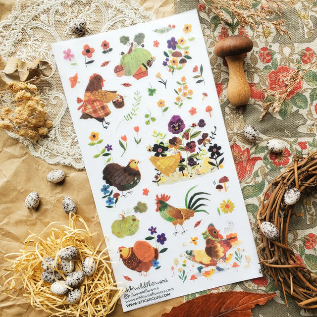 🐓🌼 A patchwork farm garden blooms to life in @nikkiwildflowers’ countryside collection. These sweet hens wander among wildflowers, pumpkins, mushrooms, and fluttering butterflies, each scene stitched with the homespun charm of a handmade quilt. From the proud rooster to the little chicks toddling through the garden, this sheet is a celebration of simple country days.

Art by: @nikkiwildflowers

One sticker sheet is included.

• Top Coating: Matte
• Adhesive Layer: Washi
• Backing Layer: Clear PET
• 6.69" 