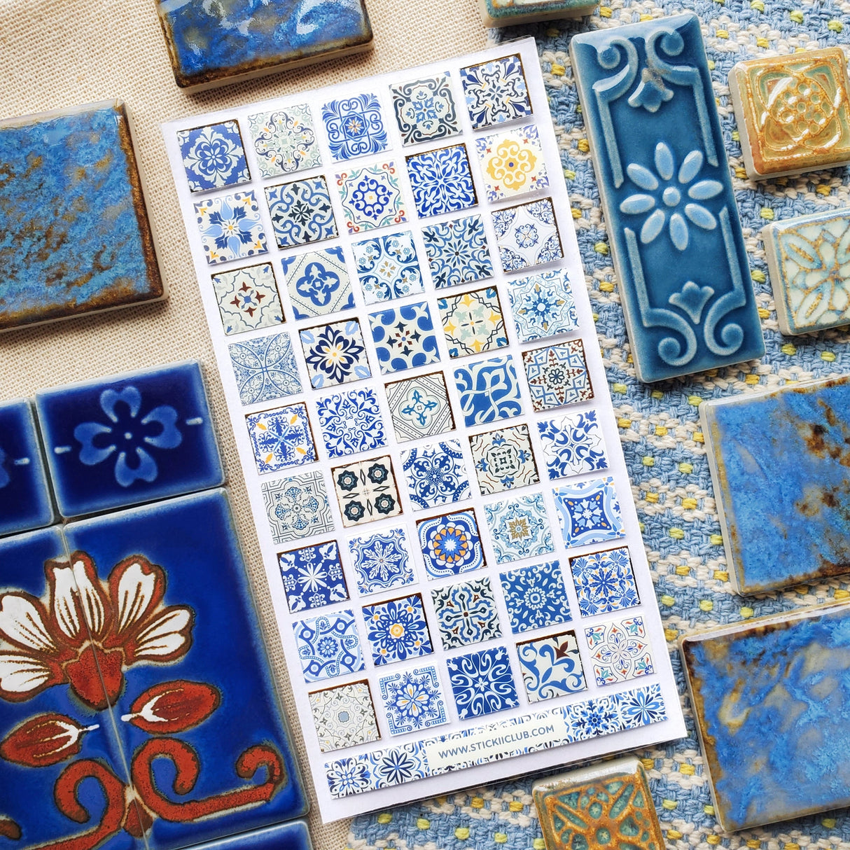 STICKII Azure Whimsy Tiles Sticker Sheet

💙✨ Bring timeless elegance to your creations with this stunning sheet of vintage tiles patterned with intricate designs and shimmering foil accents. From dainty florals to bold geometrics, every square echoes the artistry of classic ceramics in rich shades of blue and gold.