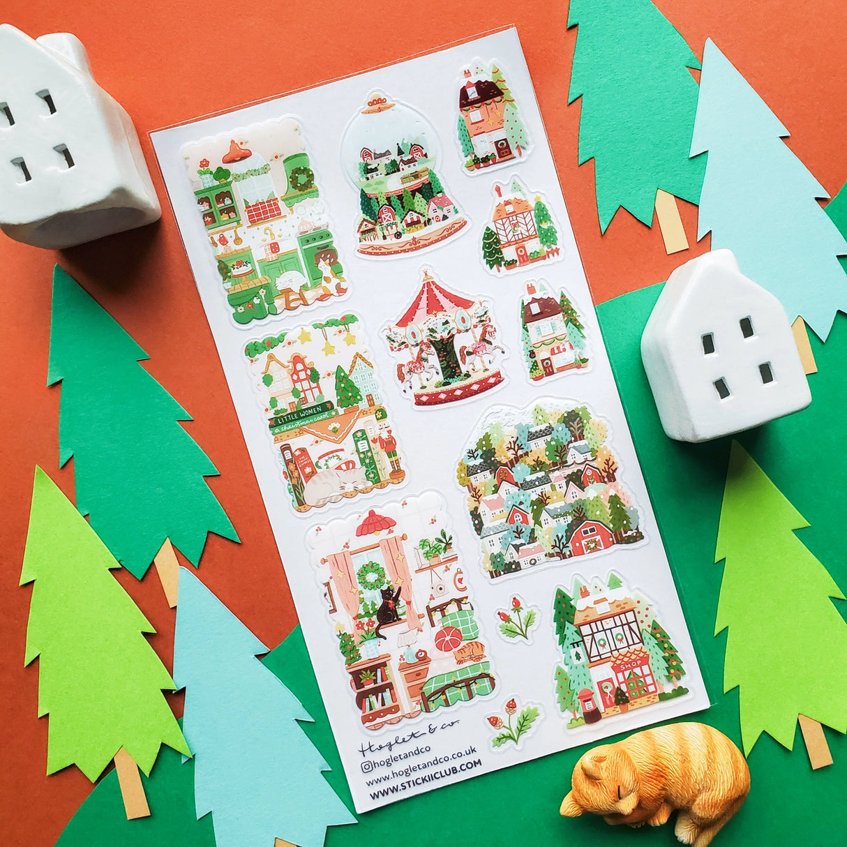 🎄🏡 Welcome to @hogletandco’s cozy winter village! From twinkling carousels to snowy cottages and curious cats by snowy windows, this charming town is brimming with holiday cheer. Take a stroll through festive markets, peek into storybook shops, and watch the magic of the season unfold.

Top Coating: None
Adhesive Layer: PVC (plastic)
Backing Layer: Clear PET
6.69" x 3.54".
Weight - 0.03lbs.
1 sheet included&nbsp;