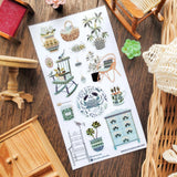 STICKII Serene Botanical Home Sticker Sheet

🪴🪑 In a quaint cottage by the sea, rocking chairs wait by sunny windows, painted pots overflow with plant life, and a spice cabinet murmurs its secrets. With gorgeous details and soft blue hues, @aliciauraa’s designs take us to a serene home where every object holds a story.