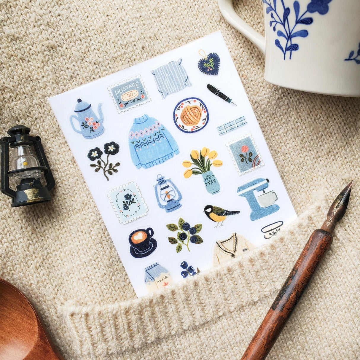 STICKII Sweater Weather Joy Sticker Sheet

🫖📖 With warm knits and teapots, brew a cozy daydream with @och_monika’s delightful set. From the soft blue sweater, a reminder of autumn days, to a vintage bicycle rolling through the garden, these designs invite us to slow down, sip some tea, and savor life’s simple pleasures.