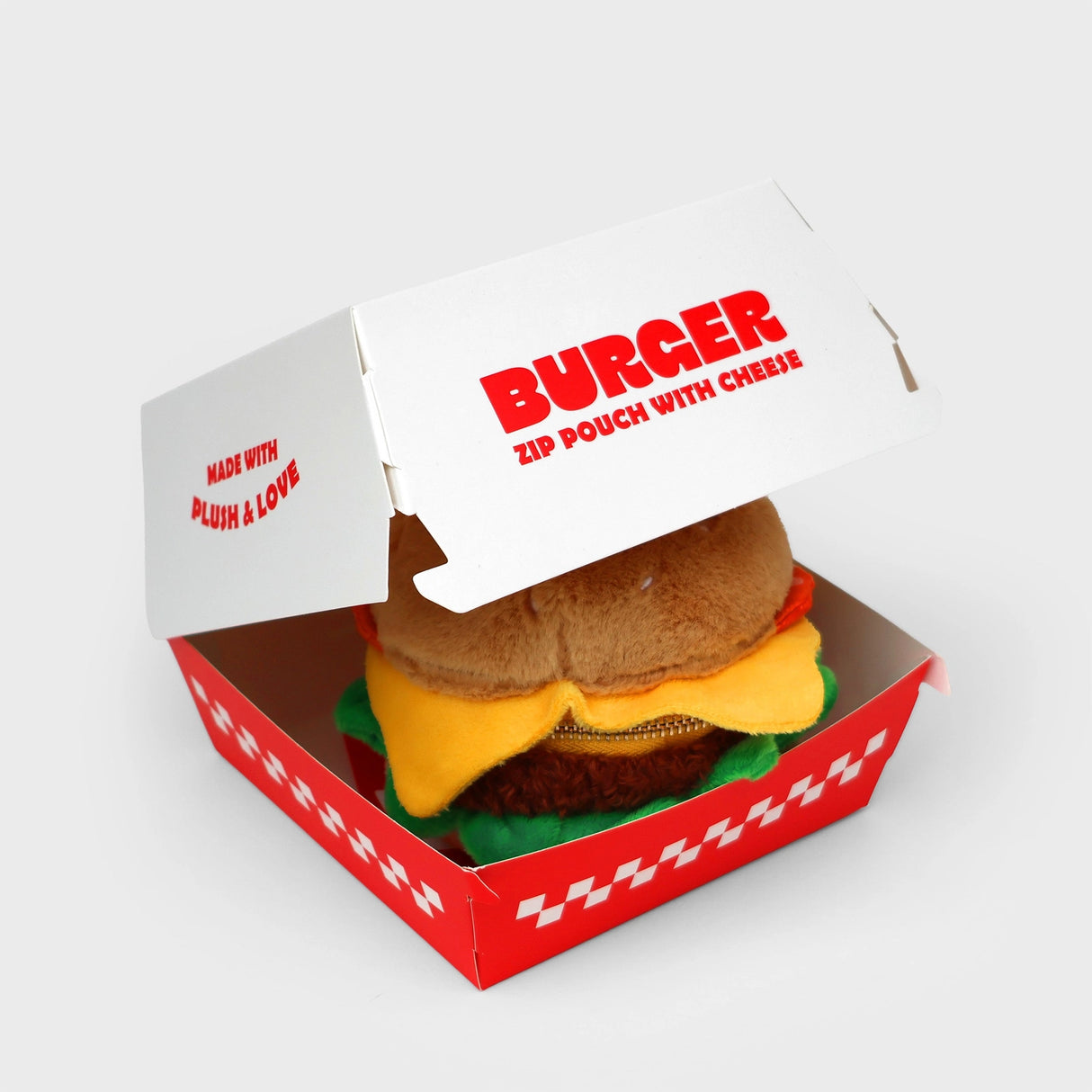 SUCK UK Plush Pouch - Hamburger

Plush burger shaped case with gold zip. Store your belongings amongst the salad and the melted cheese. Yum!

Juicy, tasty, sweet and sour. And very cute. Stuff your stuff into something soft, and squishy. Delicious looking plush zip pouches look like foodie treats but instead of calories, they hold your everyday essentials. From cheesy slices to sickly treats, each pouch is designed to be irresistible and practical. Perfect for pens, cables, cosmetics, or whatever bits and b