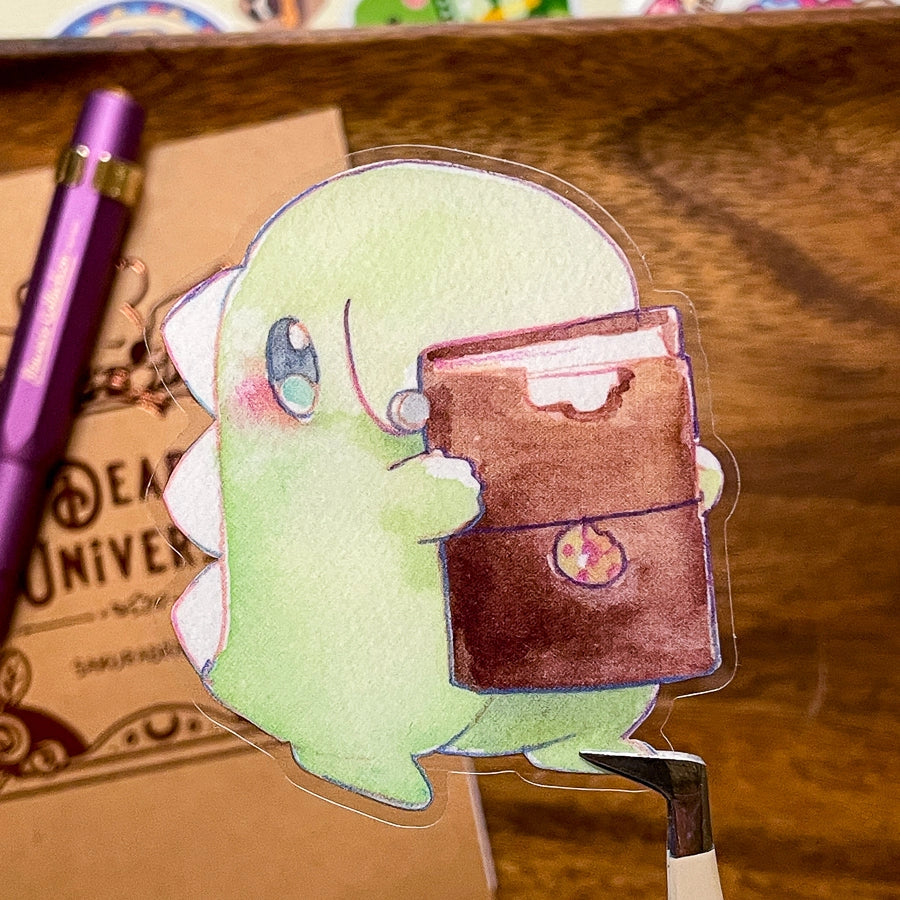Feed Me Dino thought his Journal Cover looked like chocolate but it tasted like leather...He still loves it, though. He keeps track of his favorite places to eat inside.

Dimensions:&nbsp;

2.25in x 2.5in

Material

P.E.T (oil proof, UV resistant, and waterproof)