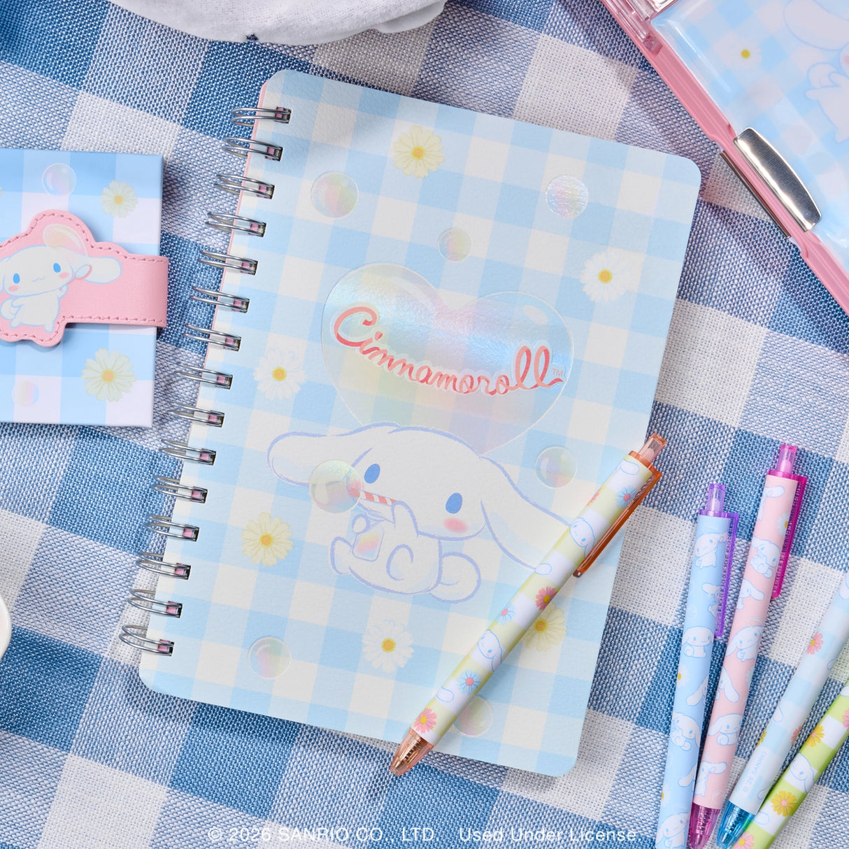 Let your ideas bloom with this Cinnamoroll™ Agatha Notebook! This spiral-bound journal features 208 lined pages, colorful reminder and tab stickers, and a double-sided pocket—perfect for planning, journaling, or gifting to any Sanrio stationery lover.