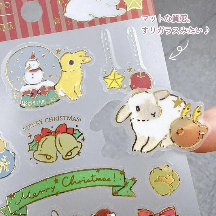 Schinako Moriyama - Christmas Sticker Sheet

Bring the fluffy fun of the holidays into your sticker collection with this sticker sheet! This is a cute sticker made of PET material with a matte coating, offering a cute sheer feel.
Luxuriously decorated with gold leaf and Christmas motifs drawn by the artist, you can enjoy seasonal decorations unique to this season.

&nbsp;Size: 90×195mm
Material: Frosted PET/ Gold Leaf
