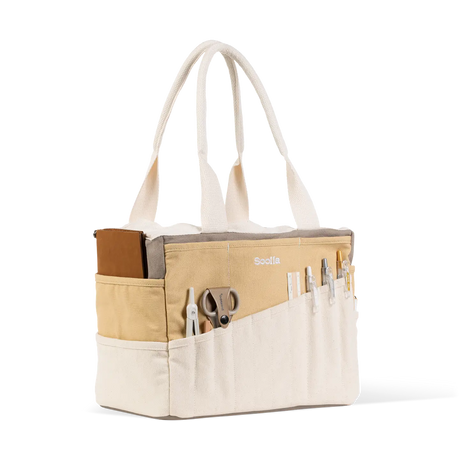 Soolla Studio Artist Bag - Driftwood

Your art is bold. Your bag should be too. The world's most loved art supply bag, pottery tool bag &amp; knitting project bag – backed by over 10,000 global artists!

✌️ 15 stunning colors ✌️

🌈 Over 30 Pockets Of Varying Sizes

🌈 Slanted Skinny Pockets : For your most-loved tools that beg for your attention (carving tools, knitting needles, crochet hooks

🌈&nbsp;Large Interior Storage + 2 interior pockets: Perfect for carrying glazes, knitting yarn, crochet supplies,