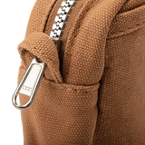 Features &amp; Specs

Front layout: 8 slanted pockets + 3 directly behind
Interior: Main compartment fits an A5 notebook; two open compartments on each wall
Back panel: 3 wide exterior pockets + one full-length slip pocket&nbsp;
Quick-drying duck canvas — sturdy, breathable, and machine-washable
Convertible design — hooks for your own strap or a Soolla strap (coming soon)&nbsp;
Structured silhouette — holds its shape even when lightly packed
Full-width YKK zipper — smooth and durable
Compact profile — fits 