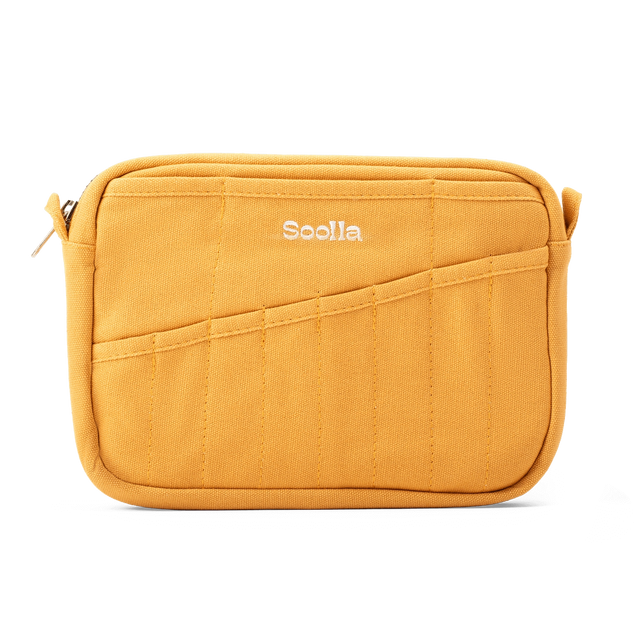 Features &amp; Specs

Front layout: 8 slanted pockets + 3 directly behind
Interior: Main compartment fits an A5 notebook; two open compartments on each wall
Back panel: 3 wide exterior pockets + one full-length slip pocket&nbsp;
Quick-drying duck canvas — sturdy, breathable, and machine-washable
Convertible design — hooks for your own strap or a Soolla strap (coming soon)&nbsp;
Structured silhouette — holds its shape even when lightly packed
Full-width YKK zipper — smooth and durable
Compact profile — fits 
