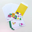 Letter writing set with a fun window signage theme by Karen Schipper.

Set includes:

8 5.82" x 8.26" writing sheets
4 illustrated envelopes
4 sticker seals