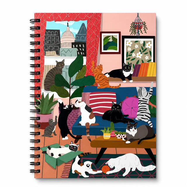 Spiral Notebook - House of Kitty Cats

A cheerful, everyday notebook designed to brighten your workspace and spark creativity. Whether you’re journaling, planning, doodling, or organizing your day, it’s a delightful companion for home, school, or the office.

A-5 Spiral Notebook
5 3/4" x 8 1/4"
Sturdy double-spiral binding
Heavy Cover Stock with 3 layers of 400 gsm
160 ruled pages
Natural white text paper