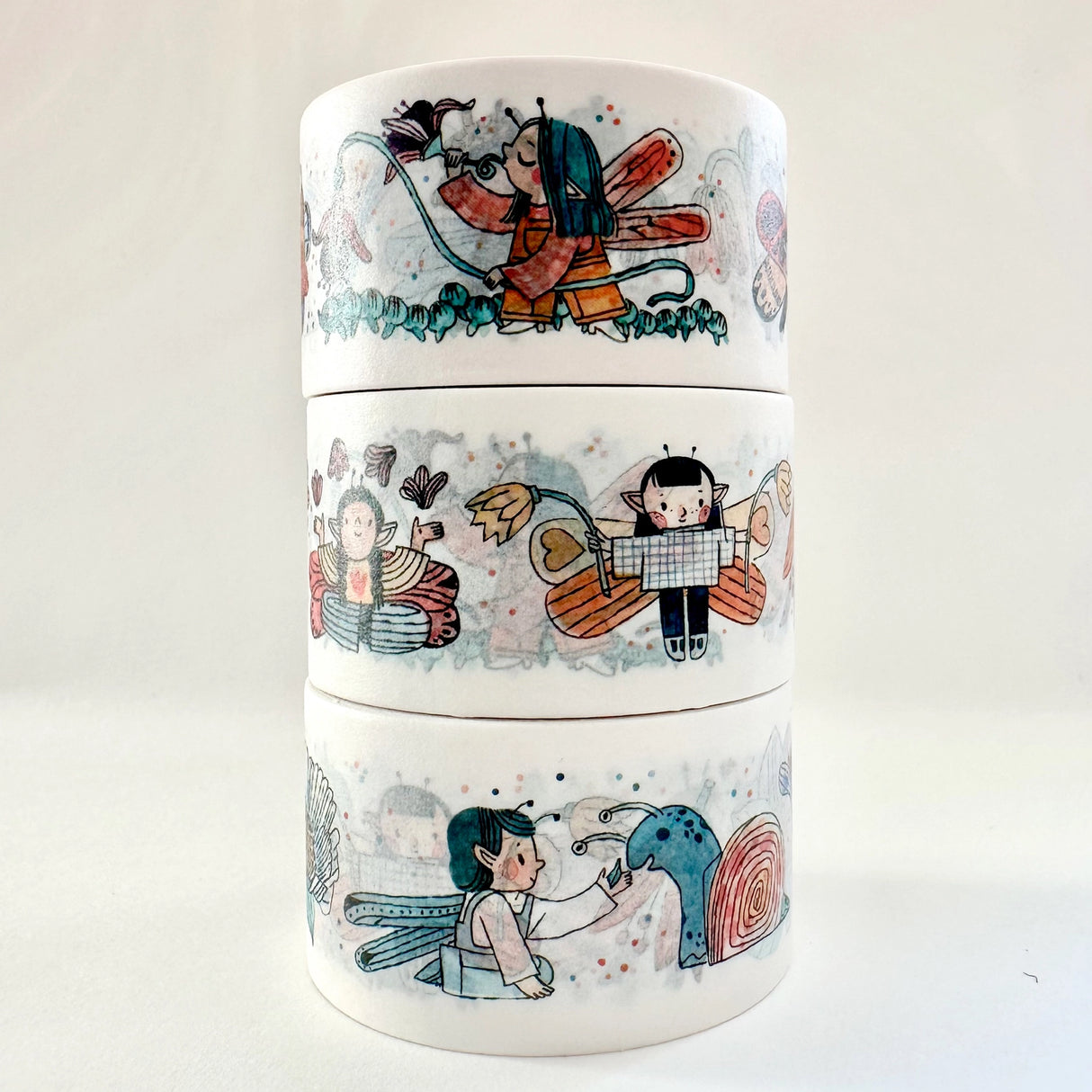Introducing this captivating collection of washi tapes, featuring the adorable Spring Fairies Washi Tape! 25mm wide.