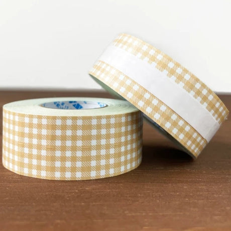 Stamp Marche Gingham Label Sticker Roll - Beige

Label stickers with Stamp Marche original designs.&nbsp;These are stickers originally for price tag applicators,now featuring a gingham check pattern!&nbsp;They can also be used to seal letters and envelopes, or as decorative materials for your planner. Fold them in half to use as index stickers or write or stamp them. Each pack contains 1,000 stickers with the same design, making them ideal for daily use or sharing.

Product Size: Approx. 55 x 21.6 mm in dia