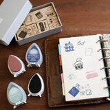 Step into a world of everyday charm with the Creator’s Stamp Box – Inside the Bag, a delightful collaboration between Stamp Marche and Sonomi Kogei. This curated set captures the little treasures we carry with us—perfect for adding personality and storytelling to your journal pages, planners, scrapbooks, and creative projects.


Each stamp is crafted with a solid wooden mount and high‑quality rubber, giving you crisp, clean impressions every time.&nbsp;



This set includes 8 stamps.

Stamp size: approx.&nb