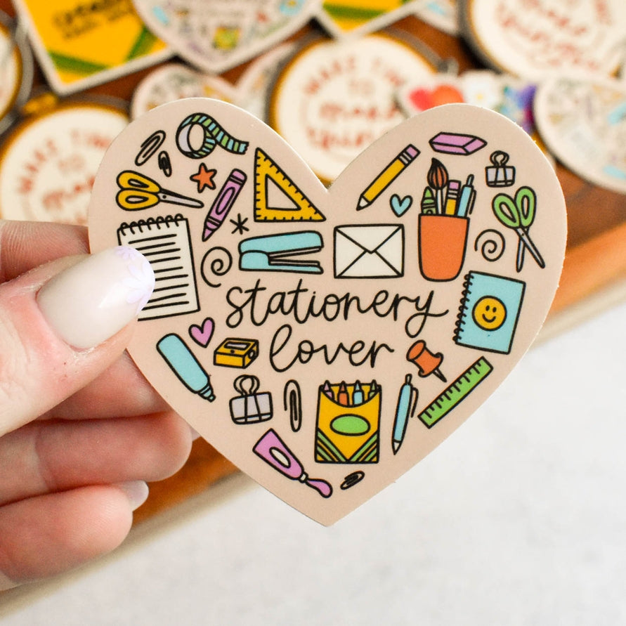 Show your love for all things paper, pens, and planning with this Stationery Lover sticker! Shaped like a heart and filled with doodles of your favorite supplies, it’s perfect for adding a crafty touch to your laptop, notebook, or journal.