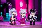 Suri's Colorful Girls Figure Dolls Blind Box carousel Three stylized figurines with colorful outfits and accessories on a vibrant background.