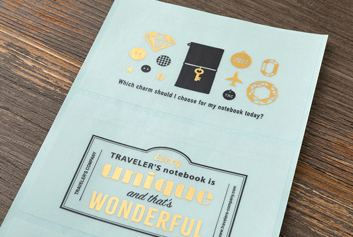 This is a sticker set for customizing your TRAVELER’S notebook that makes it more fun, including index and pocket stickers, icon stickers to represent different plans, dry transfer, and stickers to decorate the cover. The 2027 version features a design that is inspired by “Every TRAVELER’S notebook is unique and that’s wonderful.” You can customize your 2027 diary, and that’s wonderful.