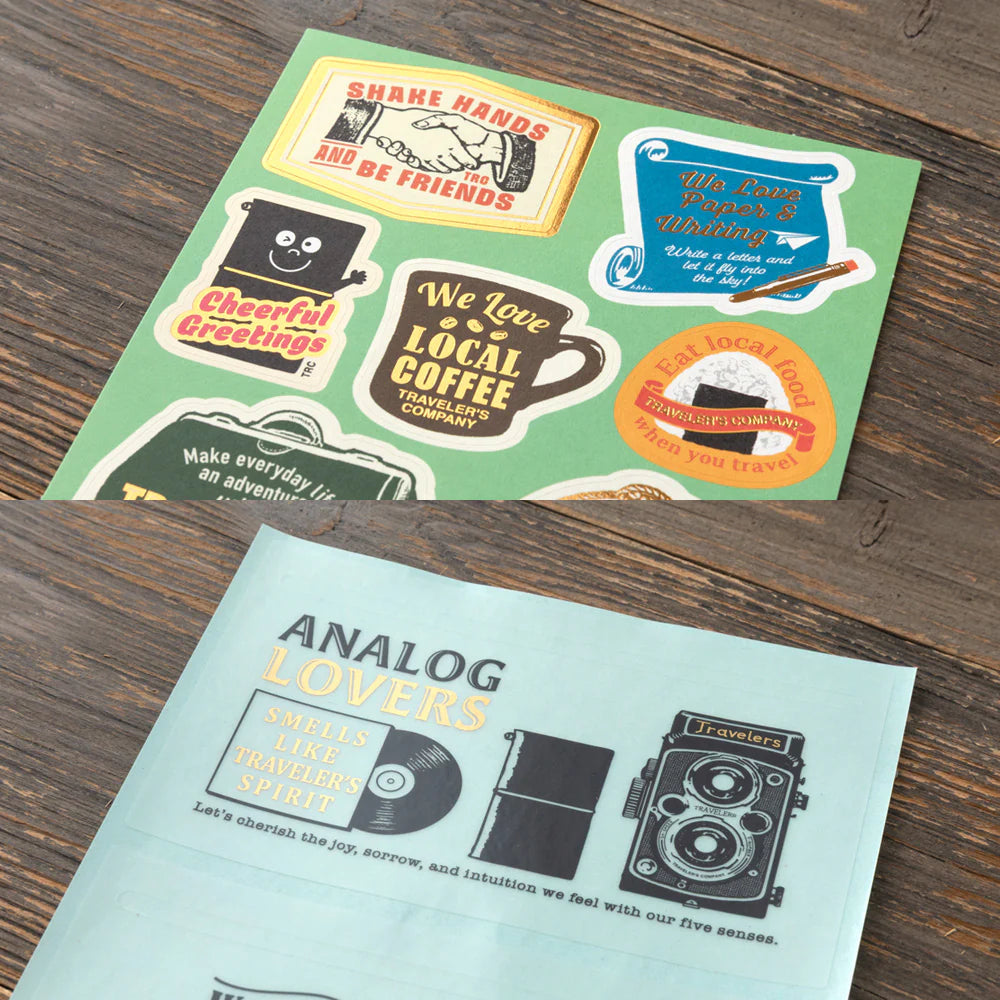 This is a sticker set for customizing TRAVELER’S notebook that makes it more fun, including index and pocket stickers, icon stickers to represent different plans, dry transfer, and stickers to decorate the cover. The 2026 version features a design with a theme of “TRAVELER'S SPIRIT"


You can customize the cover of the 2026 diary or other notebooks with stickers of analog motifs. Have a good trip with THE TRAVELER'S SPIRIT in 2026.