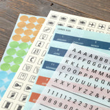 This is a sticker set for customizing TRAVELER’S notebook that makes it more fun, including index and pocket stickers, icon stickers to represent different plans, dry transfer, and stickers to decorate the cover. The 2026 version features a design with a theme of “TRAVELER'S SPIRIT"


You can customize the cover of the 2026 diary or other notebooks with stickers of analog motifs. Have a good trip with THE TRAVELER'S SPIRIT in 2026.