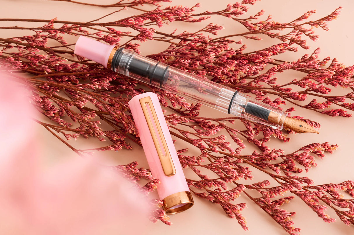 TWSBI ECO Pink Lemonade w/ Bronze Fountain Pen

Comes in EF, F, M, B, Stub1.1 nib choices

Please note: Because of the marbled finish, each pen will have a slightly different pattern, so we’re unable to accommodate specific color requests.