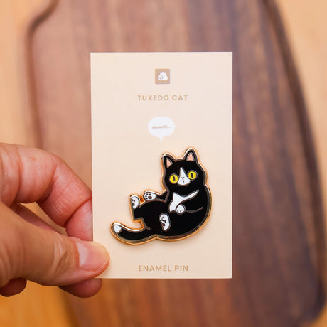Thousand Skies Tuxedo Cat Enamel Pin

This bigger than your average size pin measures 1.5" in width.

Each pin has two butterfly clasps to make it extra secure when pining it onto your jacket, fabric bag, or hat.

Please consider that monitor calibrations are all different. The color you see might slightly differ from the photo.&nbsp;

Design © Thousand Skies