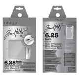 The Tim Holtz 6.25 inch / 16cm Mini Trimmer has many features not found in similar products. This product is portable and lightweight. It is perfect for trimming photographs and creating card fronts.

Features include: Hardened steel precision ground blade, Molded in measuring grid, 6.25 inch / 16cm cutting blade length and Finger guard that holds your paper in position for the perfect cut.

Width &nbsp; &nbsp;5.4 in &nbsp; &nbsp;/ &nbsp; &nbsp;13.72 cm
Height &nbsp; &nbsp;1.7 in &nbsp; &nbsp;/ &nbsp; &nbsp