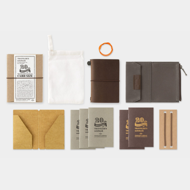 To commemorate this 20th anniversary, we’ve created a new size of TRAVELER’S notebook.

It is TRAVELER’S notebook Card Size. This TRAVELER’S notebook is always with you, even in your daily life. Whether it’s a sudden idea, information you learned or overheard, or something important you don’t want to forget— whenever and wherever you feel like writing, you can quickly grab the notebook and jot it down.