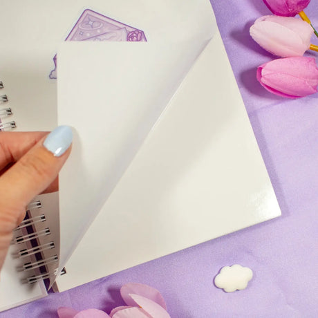 Unicorn Eclipse - Magical Memories Reusable Sticker Book

Reusable Sticker books are used to store stickers and they come with double-sided release paper to ensure stickers can stick and be removed from the page cleanly. They’re great for collecting stickers!

✧Size &amp; Materials✧

Size (WxH): 5.75 in x 8.25 in (A5)
50 sheets (100 in total including both sides)
Sticker release paper with frosted clear cover
Sticker not included