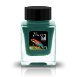 Venom Teal Shimmer combines a dark teal base with an intense magenta sheen and dazzling blue shimmer. The teal-magenta contrast creates a bioluminescent tropical effect, with light strokes glowing turquoise and heavy pools revealing a dramatic plum-violet sheen inspired by the vivid warning colors of venomous rainforest frogs.