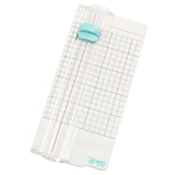 The We R Makers Mini Trimmer Tool is a compact and versatile solution for all your paper trimming needs. Perfectly sized for crafting on the go or in tight spaces, this trimmer offers precise cuts for cardstock, paper, and other crafting materials. Whether you're creating handmade cards, scrapbooking, journaling, or engaging in other DIY crafts, this mini trimmer provides the flexibility and accuracy required for professional-looking results. 