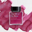A warm raspberry rose base is accented with cool silver and blue glitter that softly sparkles through the surface, capturing both the beauty and tragedy of human love as seen through the eyes of a fairy.