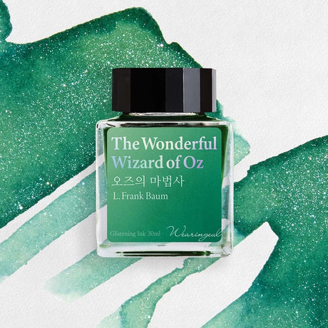 A vivid emerald green is infused with mysterious silver and blue shimmer, weaving through the surface with an ethereal glow and capturing the fantastical journey toward the Emerald City.