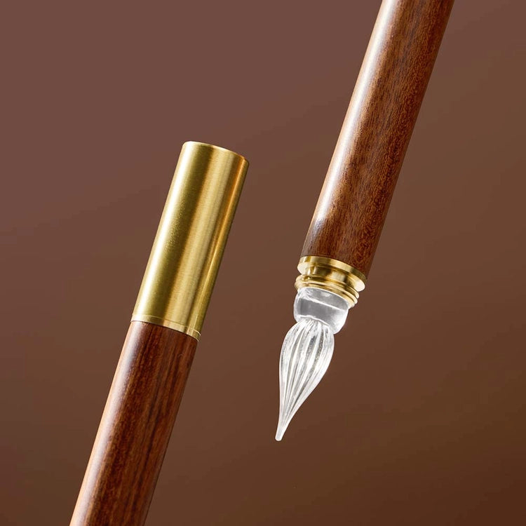 A modular glass pen that combines a glass nib with an elegant rosewood body.&nbsp;

The modular design allows the pen to be used for many years to come due to its easy nib replacement system. Designed to be easy to use and clean, the nib can be detached easily and lightly rinsed with water for cleaning.

The screw on brass cap allows for safe transport and storage making it perfect for use on the go.&nbsp;