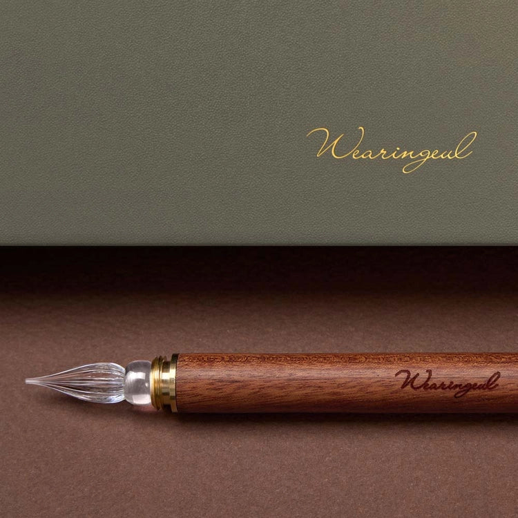 A modular glass pen that combines a glass nib with an elegant rosewood body.&nbsp;

The modular design allows the pen to be used for many years to come due to its easy nib replacement system. Designed to be easy to use and clean, the nib can be detached easily and lightly rinsed with water for cleaning.

The screw on brass cap allows for safe transport and storage making it perfect for use on the go.&nbsp;