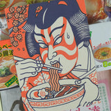 This illustration is inspired by Japanese prints (ukiyo-e) and represents a traditional Kabuki theater actor eating a bowl of ramen.

• A6 size postcard (10.5 x 14.8cm)
• Fedrigoni Woodstock 260g/m2 paper
• 80% recycled fibers, acid-free, FSC certified
• printed in France