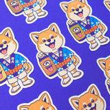 This is Mimi the Shiba - one of our original characters - he is dressed up to participate in a matsuri (Japanese festival) and he is holding a Chôchin-obake, a famous yokai-lantern in Japanese folklore.

• Vinyl sticker with holographic effect
• 4.6 x 7.3 cm
• Without PVC
• Anti-UV varnish
• Can be used outside
• Printed in Sweden