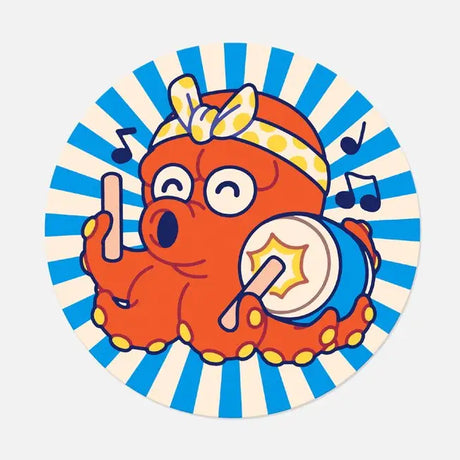 Takotarô is one of our original characters. It is inspired by the mascots that can be found on the front of takoyaki stands, these small balls of dough filled with octopus.
The name Takotaro is composed of the Japanese word “tako” which means “octopus” and the suffix “tarô” which means “eldest son” and which is added to many Japanese first names.
He can be seen here playing the taiko, which means “drum” in Japanese.

• Vinyl sticker
• 6.2 x 6.2 cm
• PVC-free
• Anti-UV varnish
• Can be used outside
• Printed