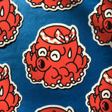 Takotaro is one of our original characters. It is inspired by the mascots that can be found on the front of takoyaki stands, these small dumplings filled with octopus.
The name Takotaro is composed of the Japanese word “tako” which means “octopus” and the suffix “taro” which means “eldest son” and which is added to many Japanese names.

• Vinyl sticker
• 3.8x9 cm
• PVC free
• Anti-UV varnish
• Can be used outside
• Printed in Sweden