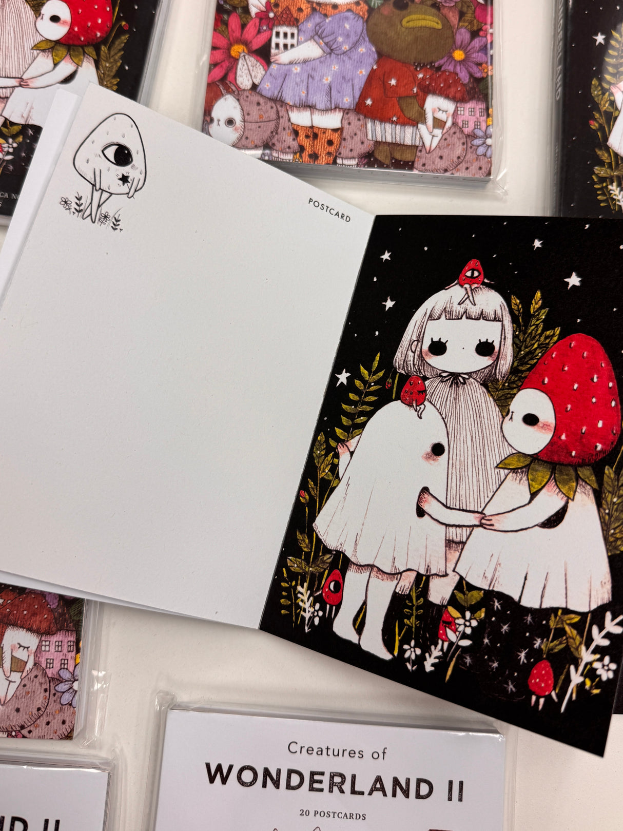 jb0xtchi Postcard Set - Creatures of Wonderland

The Creatures of Wonderland Postcard Set includes 20 postcards featuring artwork illustrated by jb0xtchi (Jessica Ng). jb0xtchi creates stationary and small trinkets from whimsical ideas in the form of painting using ink, watercolor, and gouache.

6in x 4in postcards
20 different designs
All artwork done by Jessica Ng
