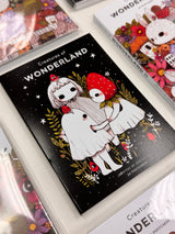 jb0xtchi Postcard Set - Creatures of Wonderland

The Creatures of Wonderland Postcard Set includes 20 postcards featuring artwork illustrated by jb0xtchi (Jessica Ng). jb0xtchi creates stationary and small trinkets from whimsical ideas in the form of painting using ink, watercolor, and gouache.

6in x 4in postcards
20 different designs
All artwork done by Jessica Ng