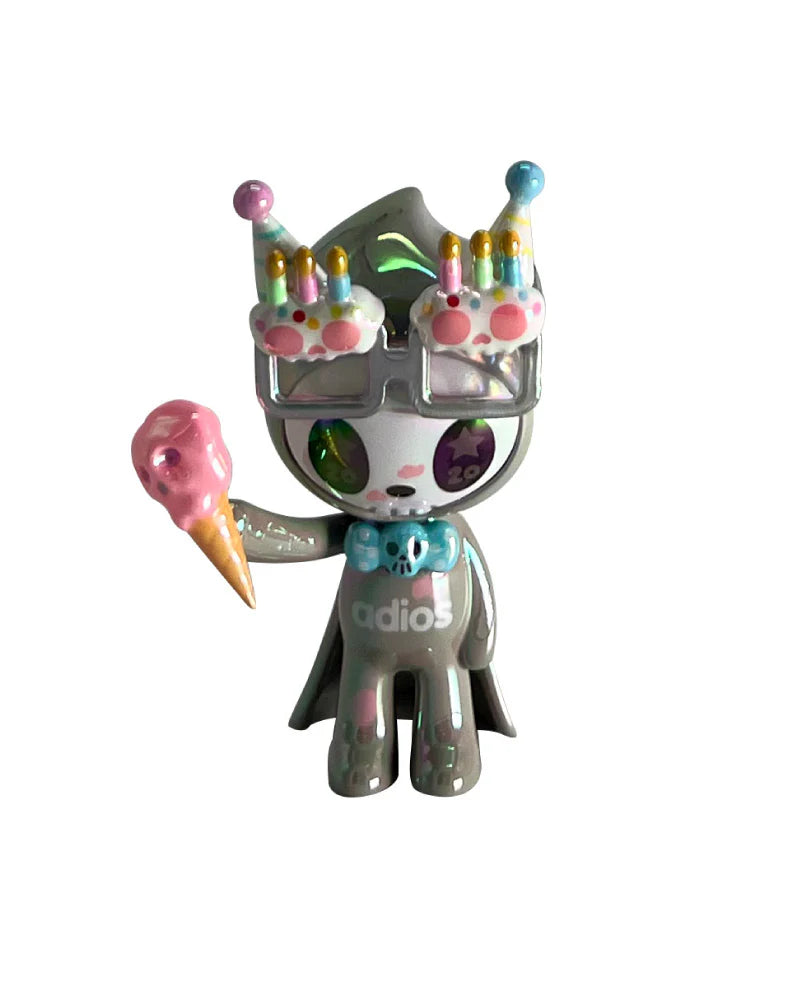 Celebrate 20 years of tokidoki with our 20th Anniversary Blind Box! This series features iconic characters reimagined in party-ready designs, including Donutella, Nijiko, Mozzarella, Adios, Mermicorno, and more—plus a special chaser, Party Bubbly! Join the celebration of two decades of signature & artwork, unforgettable characters, and kawaii culture with this must-have blind box collection for every tokidoki fan!