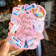 Adorn your laptop, notebook, car, or just about anything that might need a little extra beauty!

This die-cut, matte sticker measures 3 x 4″ and is printed at the highest quality!

Lettering is in a metallic GOLD