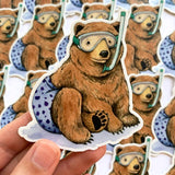 Pegatina de oso haciendo esnórquel